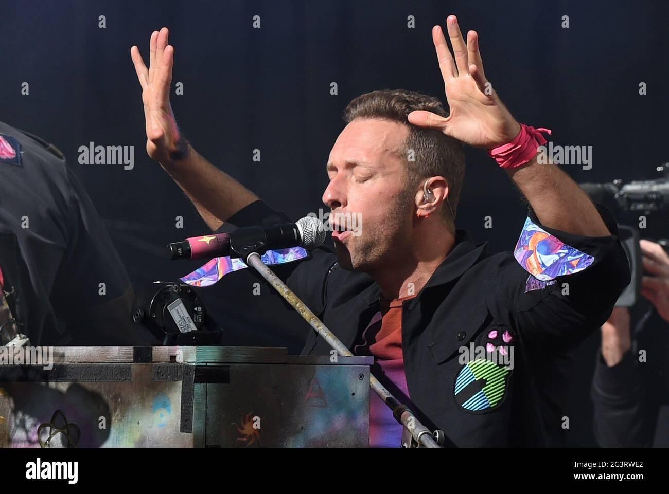 Coldplay band performing live in concert in the year 2021