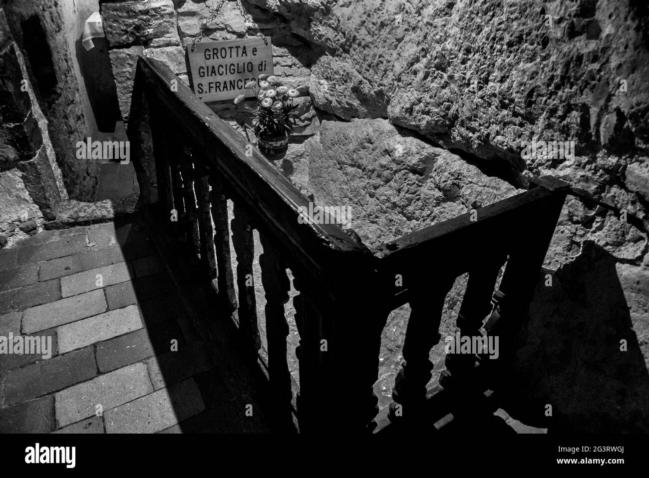 Assisi, Umbria, Italy: the bed where Saint Francis of Assisi slept inside the prison hermitage Stock Photo