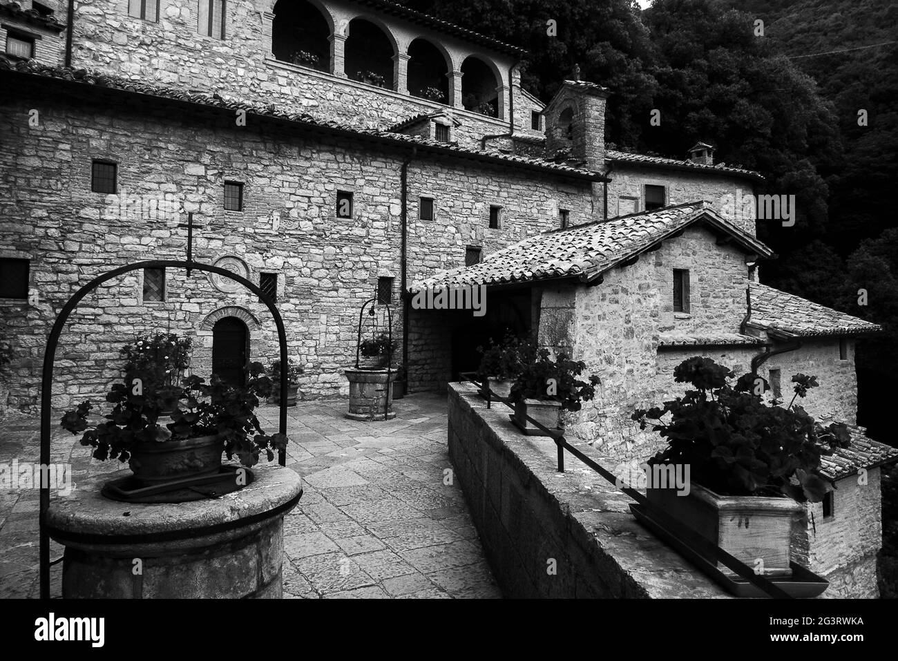 Assisi, Umbria, Italy: the cloister in the hermitage of the prisons of Saint Francis of Assisi Stock Photo