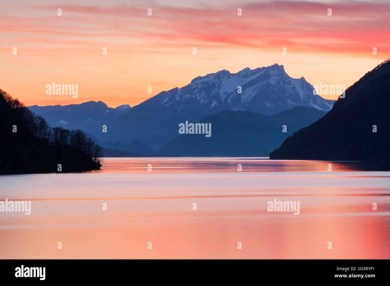 lake with mountain scenery, vista from Brunnen over Lake Lucerne at sunset, Mount Pilatus in the background, Switzerland Stock Photo