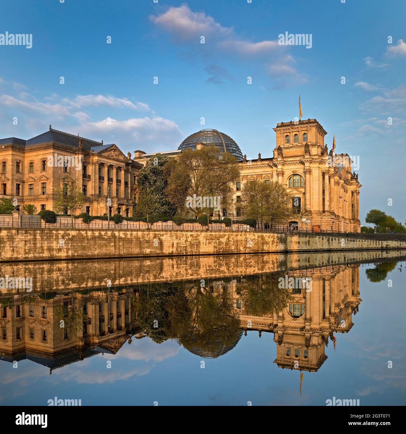 Reichstag building with Spree in morning light, German Bundestag at the gouvernment district, Germany, Berlin Stock Photo