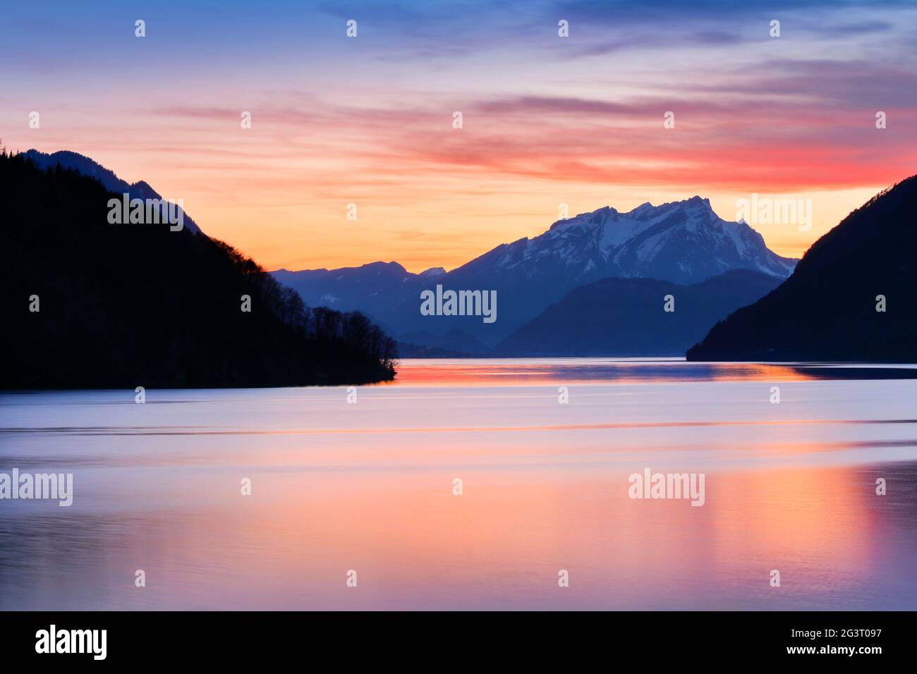 lake with mountain scenery, vista from Brunnen over Lake Lucerne at sunset, Mount Pilatus in the background, Switzerland Stock Photo