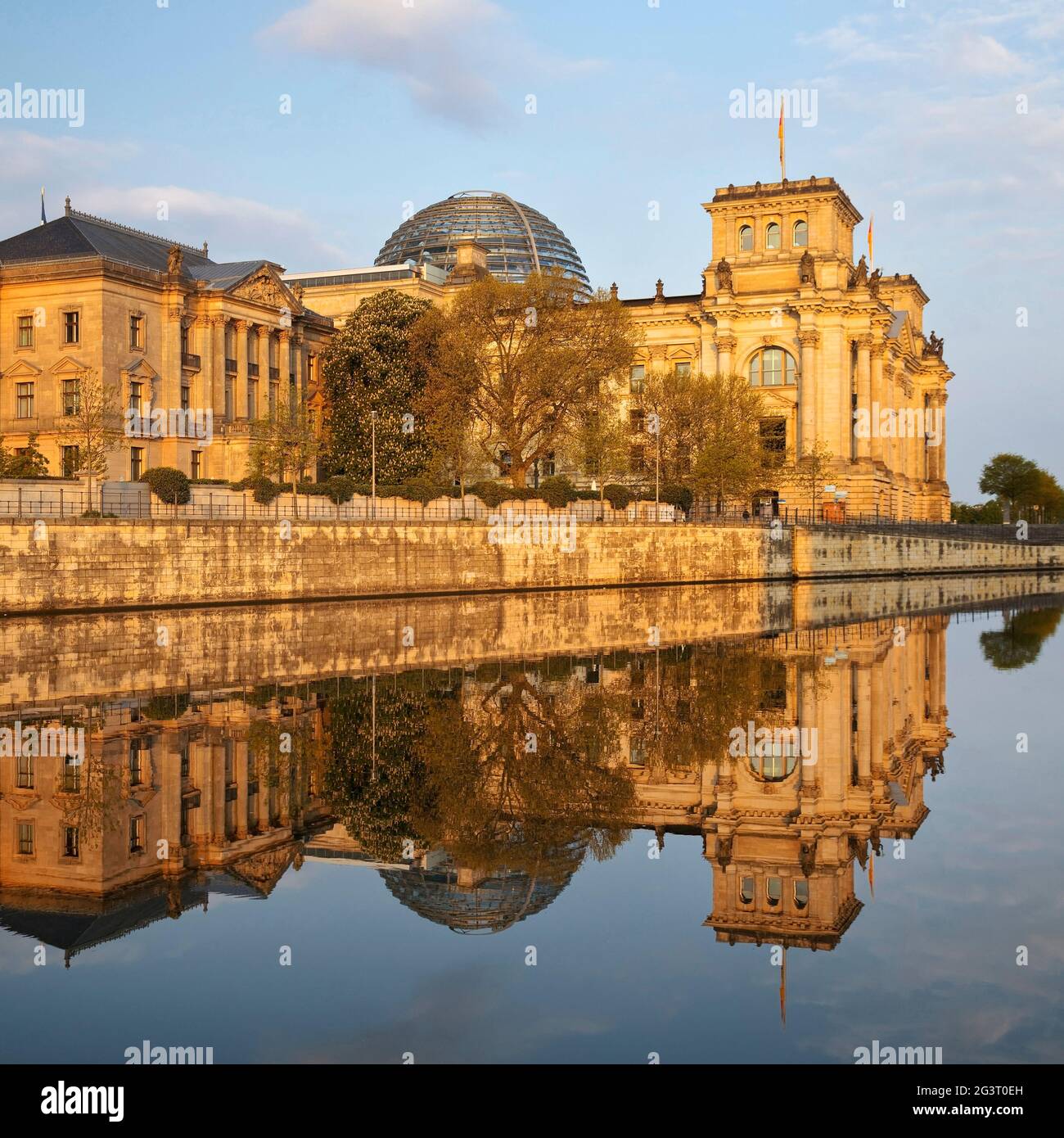Reichstag building with Spree in morning light, German Bundestag at the gouvernment district, Germany, Berlin Stock Photo