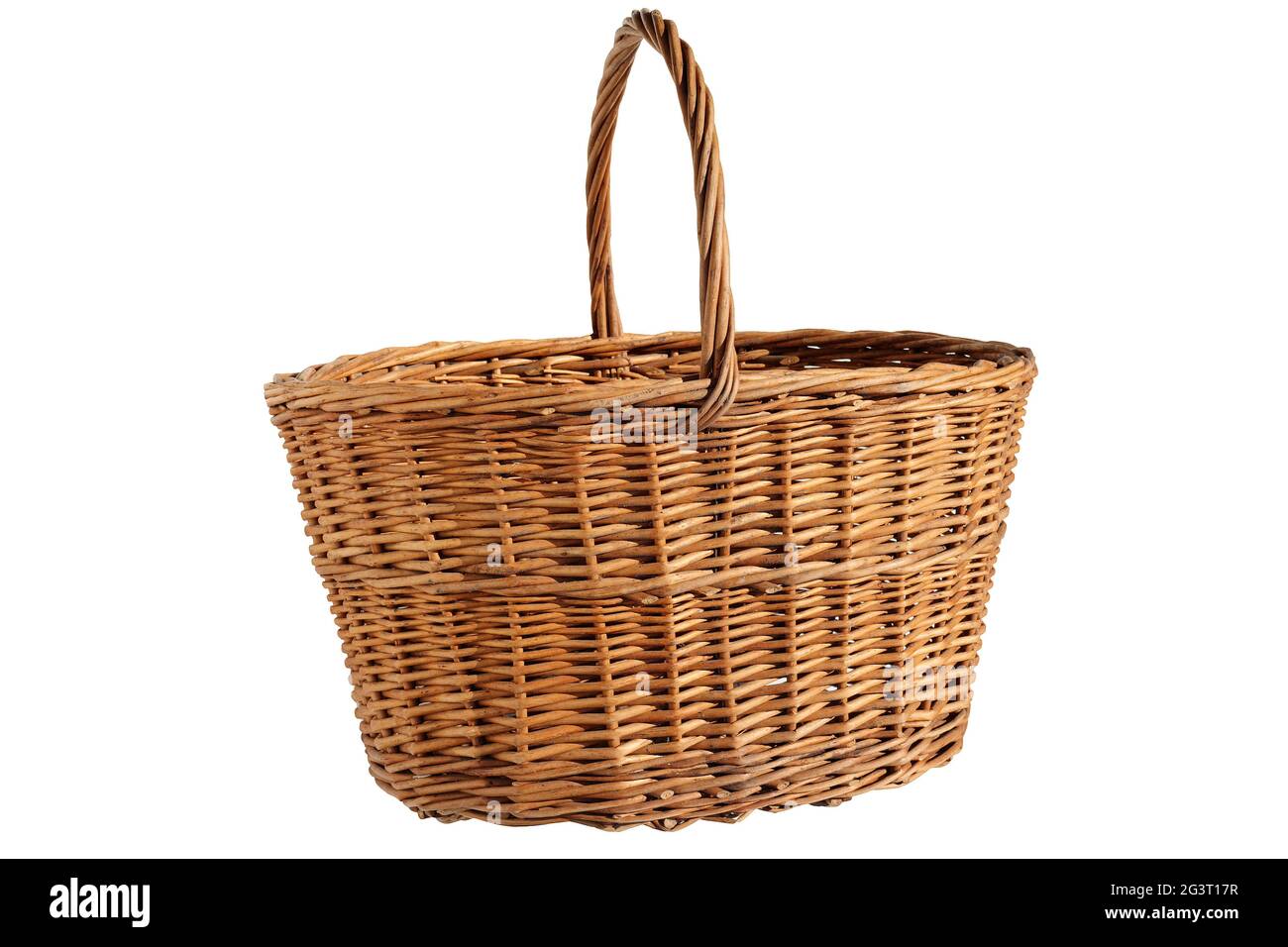 Wicker wooden basket with a round handle. Front view. Isolated on a white background Stock Photo