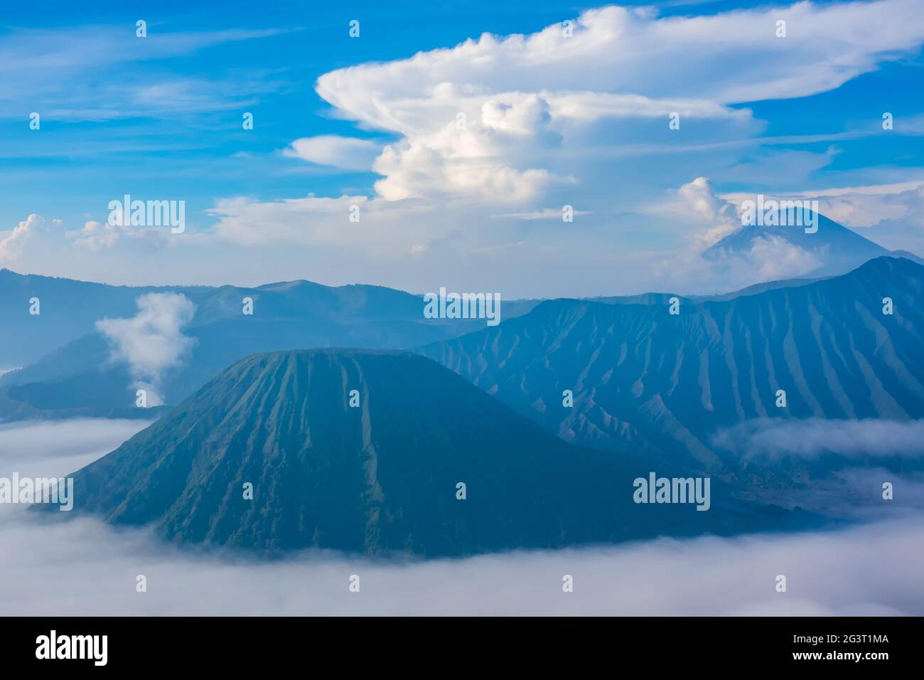 Java Volcanoes and Morning Fog Stock Photo