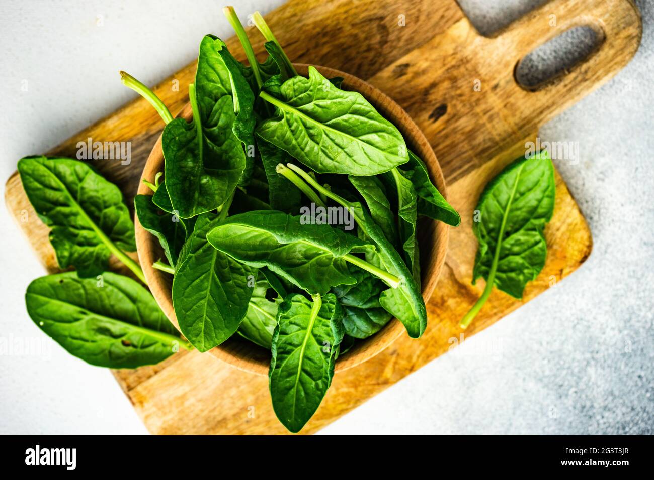 Organic food concept with fresh spinach Stock Photo
