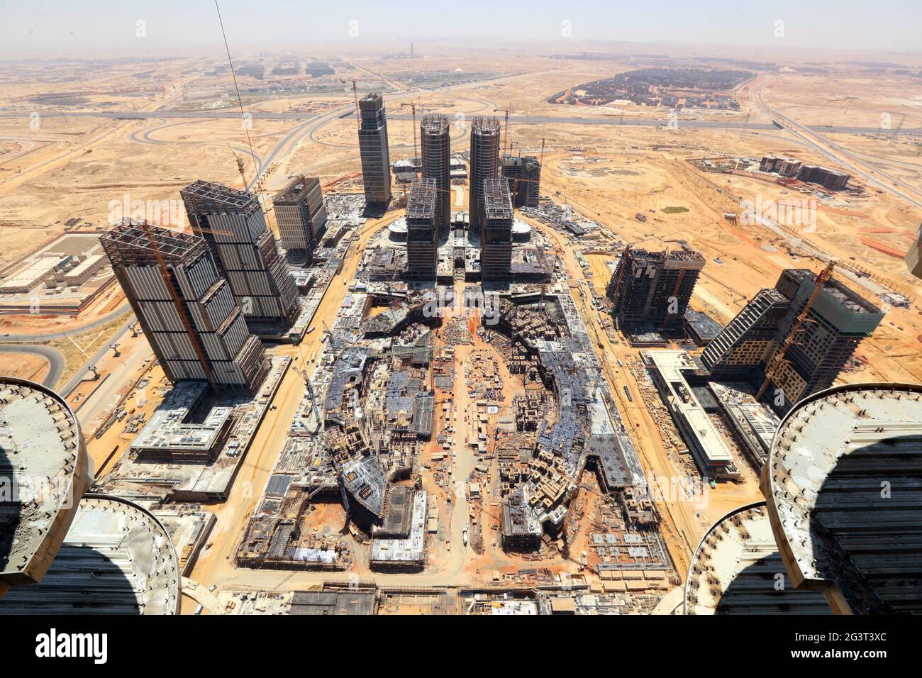 New Administrative Capital, Egypt. 17th June, 2021. Photo taken from the Iconic Tower on June 17, 2021 shows the construction site of the central business district (CBD) project in new administrative capital, Egypt. With a commanding view of the modern buildings sprouting up in the central business district (CBD) of Egypt's new administrative capital, guests from China and Egypt on Thursday held a topping-out ceremony for the 385-meter-high Iconic Tower, which will be the tallest building in Africa upon completion. Credit: Sui Xiankai/Xinhua/Alamy Live News Stock Photo