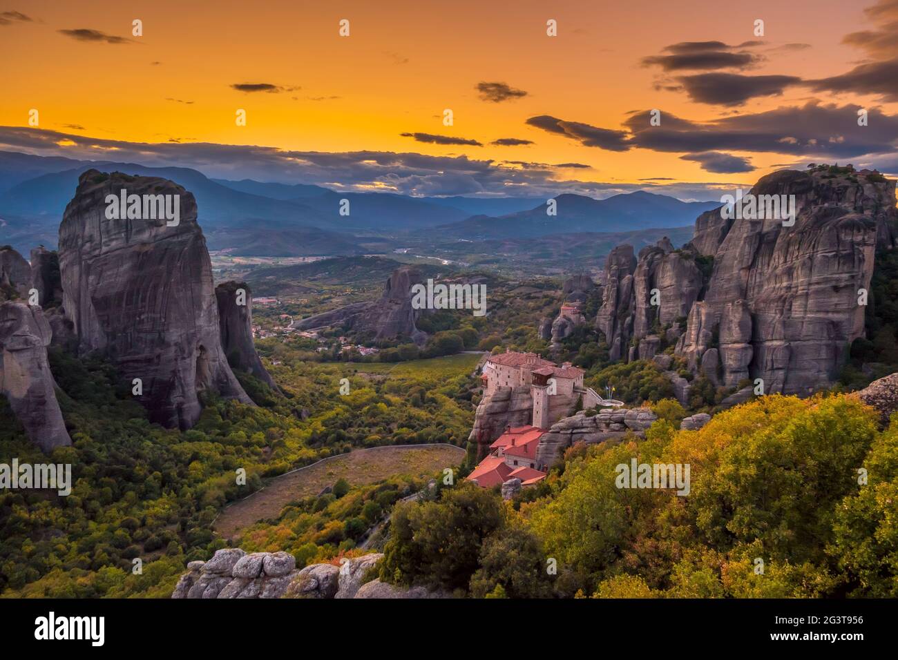 Greek Rock Monasteries After Sunset Stock Photo