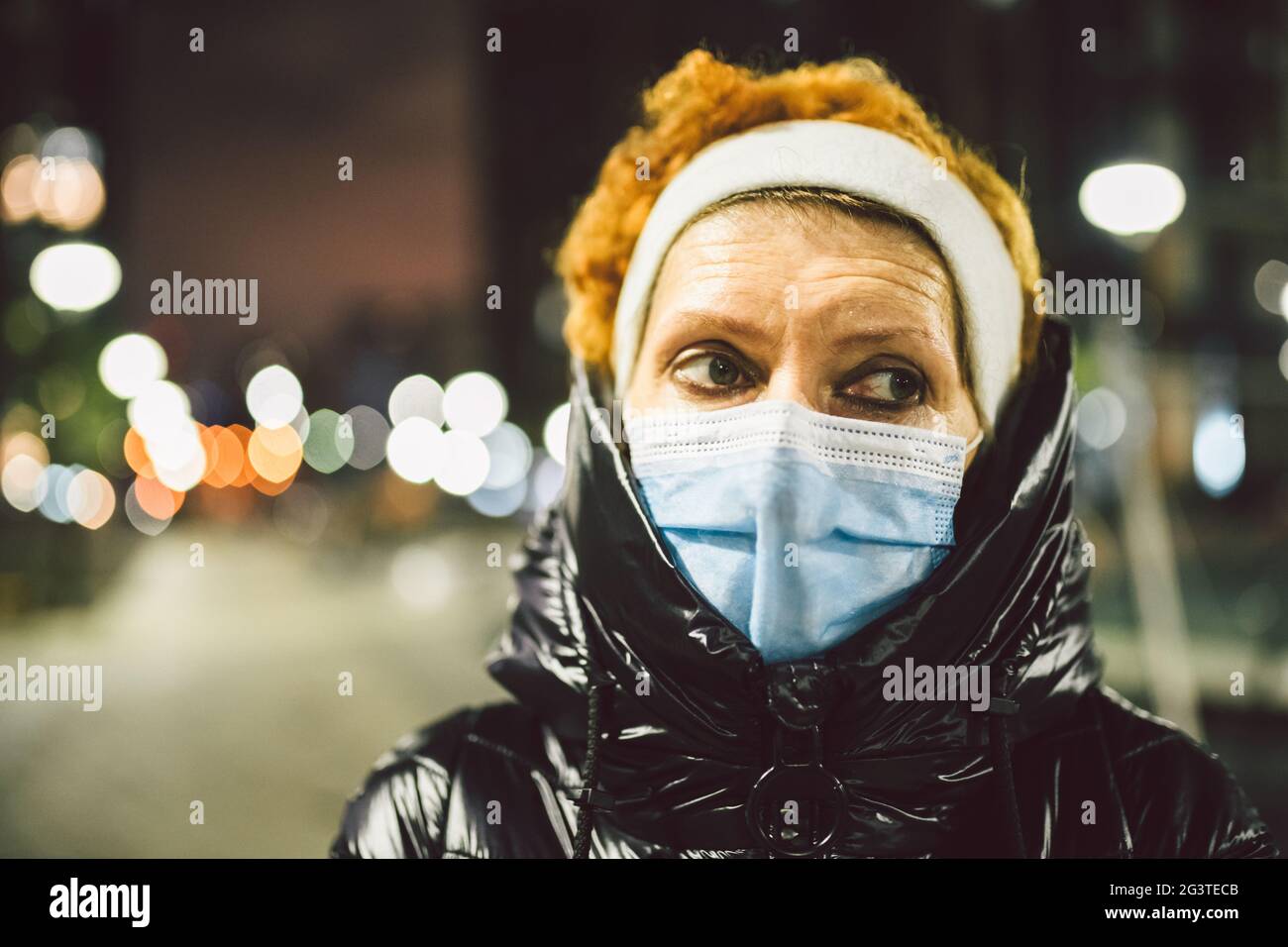 Mature woman with face mask on hi-res stock photography and images - Alamy