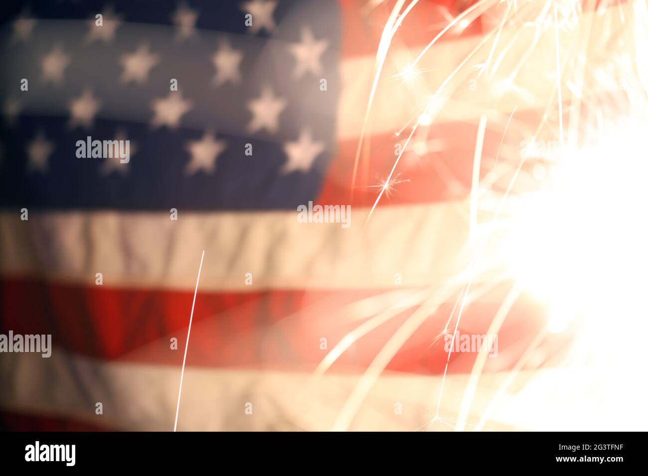 USA American flag lit up by sparklers for 4th of July celebrations ...