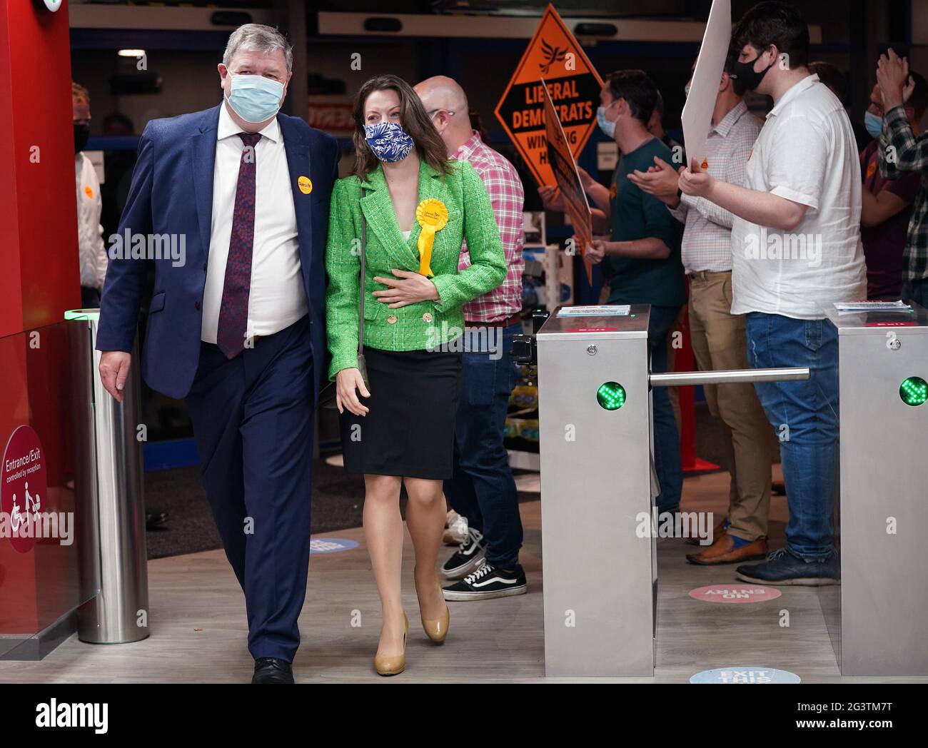 Liberal Democrat candidate Sarah Green and Alistair Carmichael, Liberal Democrat MP for Orkney and Shetland, are greeted by party supporters upon arriving for the declaration in the Chesham and Amersham by-election at Chesham Leisure Centre in Chesham, Buckinghamshire. Picture date: Friday June 18, 2021. Stock Photo
