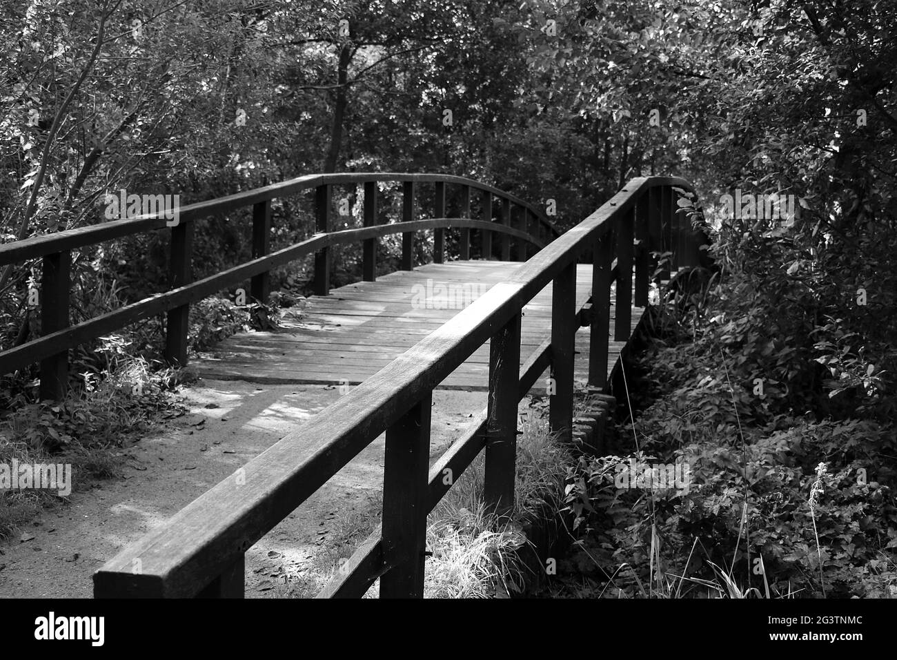 Timber pedestrian bridge Black and White Stock Photos & Images - Alamy