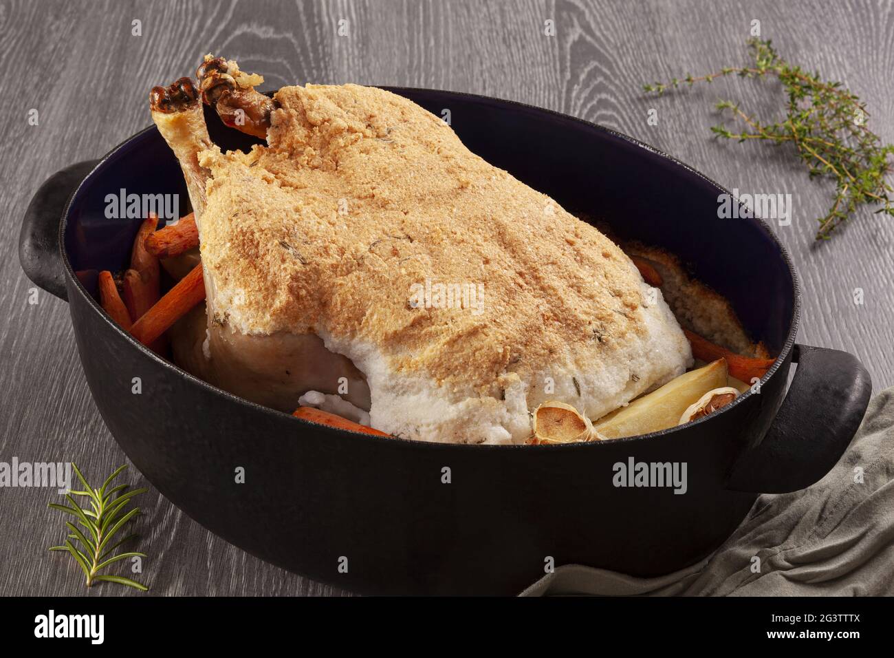 Salt crusted chicken with vegetable. Stock Photo