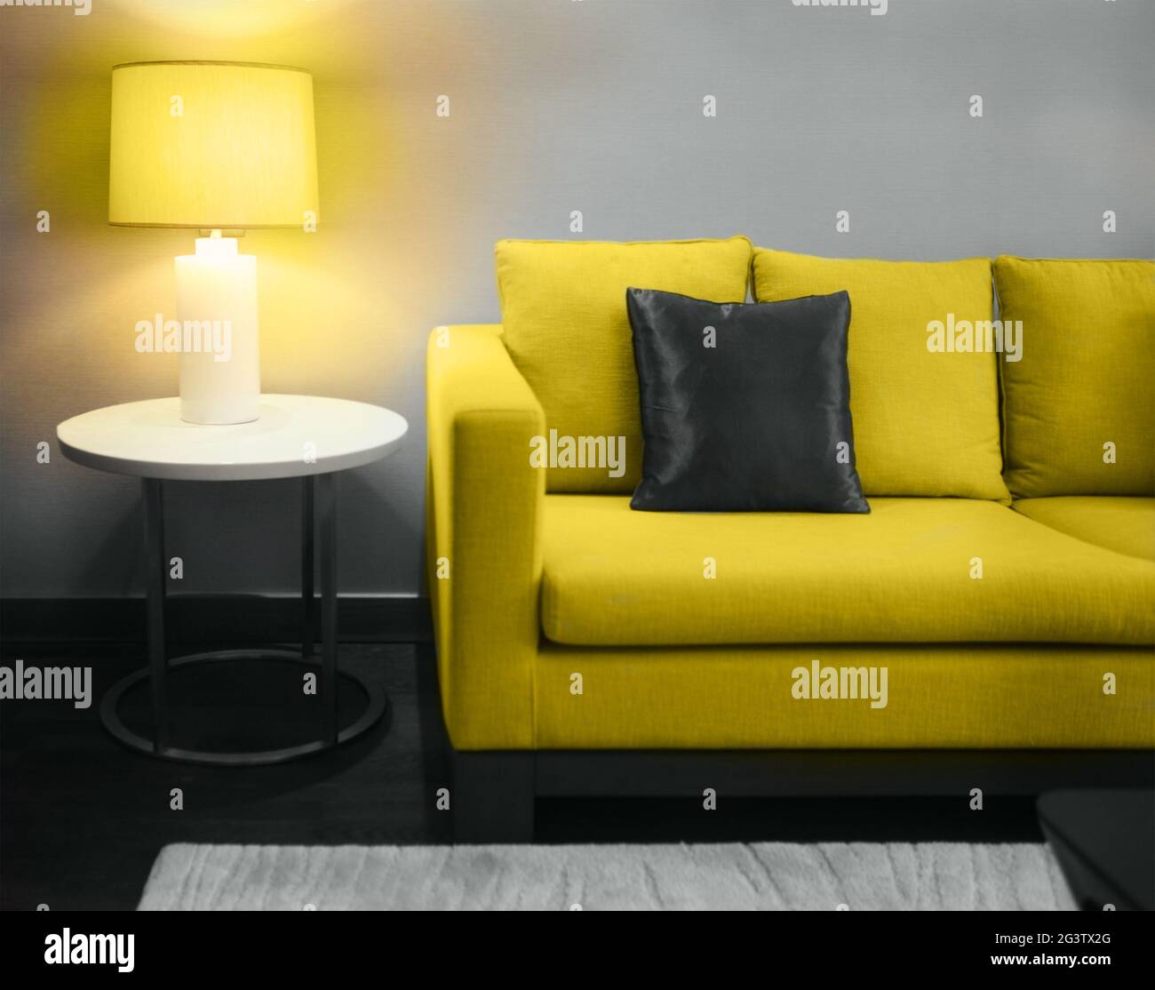 Beautiful living room with yellow sofa Stock Photo - Alamy