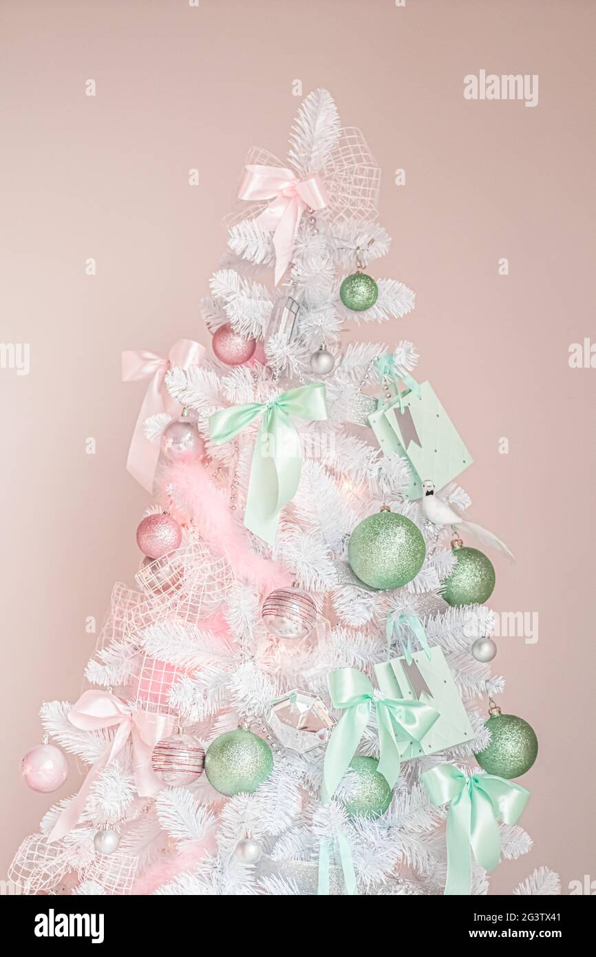 Pastel Christmas tree look, decor in modern style as holiday home  decoration Stock Photo - Alamy