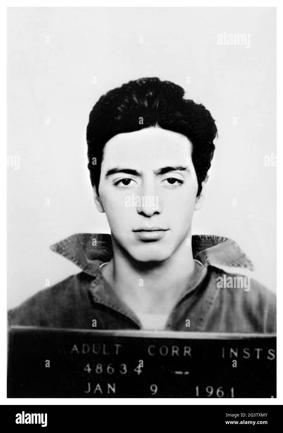 1961, 9 january , Woonsocket, Rhode Island , USA : The celebrated movie actor AL PACINO ( Alphonse , born in 1940 ) when was a teenager boy aged 20 arrested by Police Department on suspicion of Attempted Robbery in the official mug shot . Pacino reportedly spent three days in jail . Unknown photographer of Police Department of Woonsocket , Rhode Island. - HISTORY - FOTO STORICHE - personalità da giovani giovane - personality personalities when was young - gioventù - giovinezza - ATTORE - MOVIE - CINEMA - TEATRO - THEATRE - ARRESTO - Arrestation - ARRESTATO DALLA POLIZIA - FOTO SEGNALETICA - mu Stock Photo