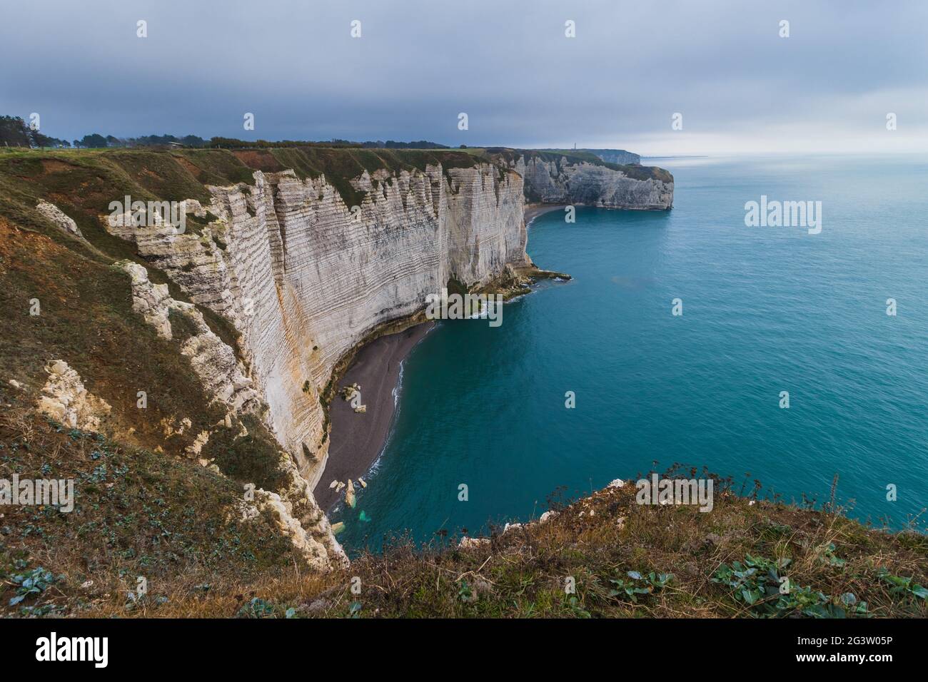 Famous Etretat Aval cliff and natural arch landmark by the ocean in ...