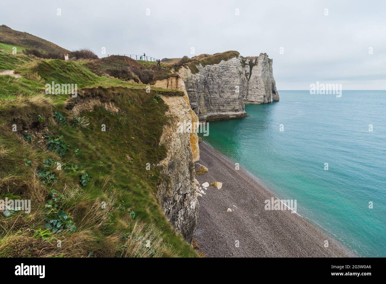 Famous Etretat Aval cliff and natural arch landmark by the ocean in ...