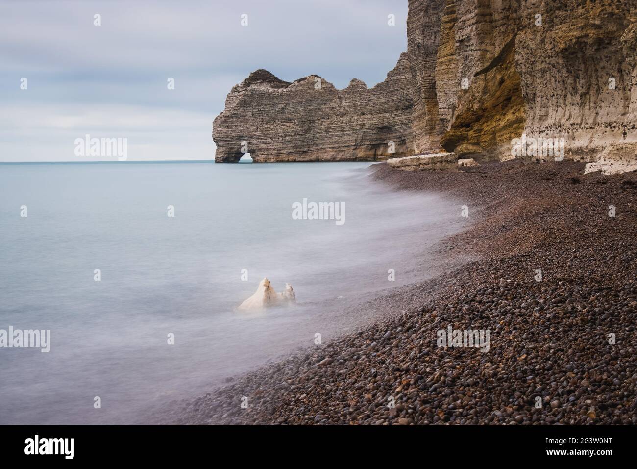 Famous Etretat Aval cliff and natural arch landmark by the ocean in ...