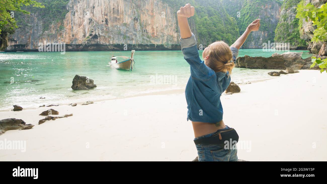 Female tourist enjoying summertime on beautiful tropical island Stock Photo