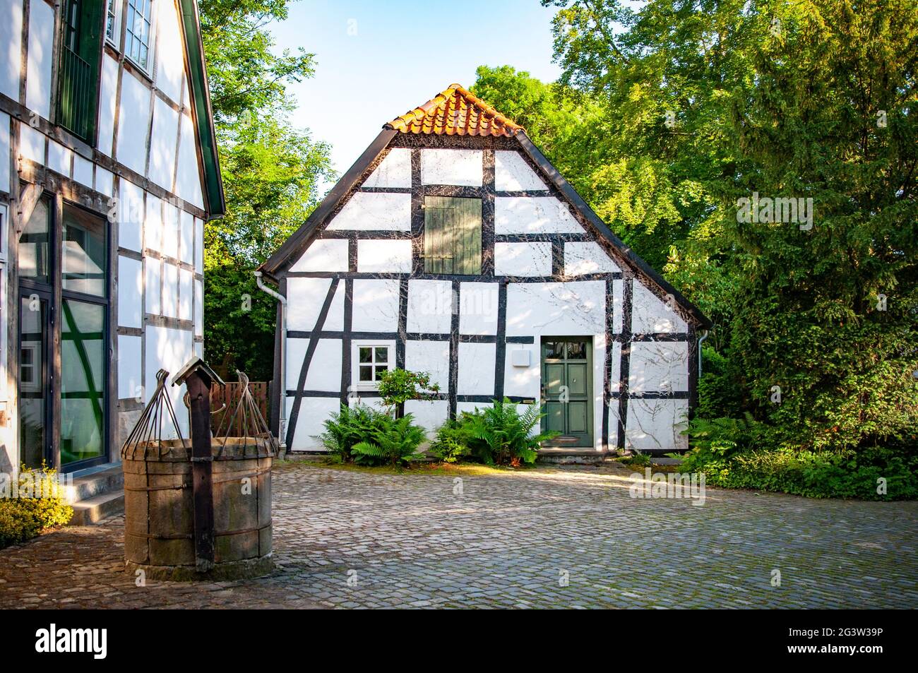 BUNDE, GERMANY. JUNE 12, 2021. Beautiful view of small german town with typical architecture. Fachwerk style, Prussian wall. Stock Photo