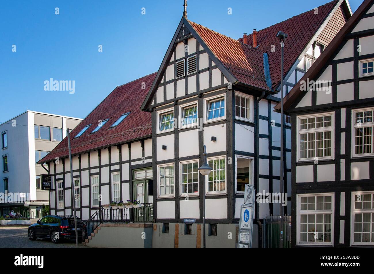 BUNDE, GERMANY. JUNE 12, 2021. Beautiful view of small german town with typical architecture. Fachwerk style, Prussian wall. Stock Photo