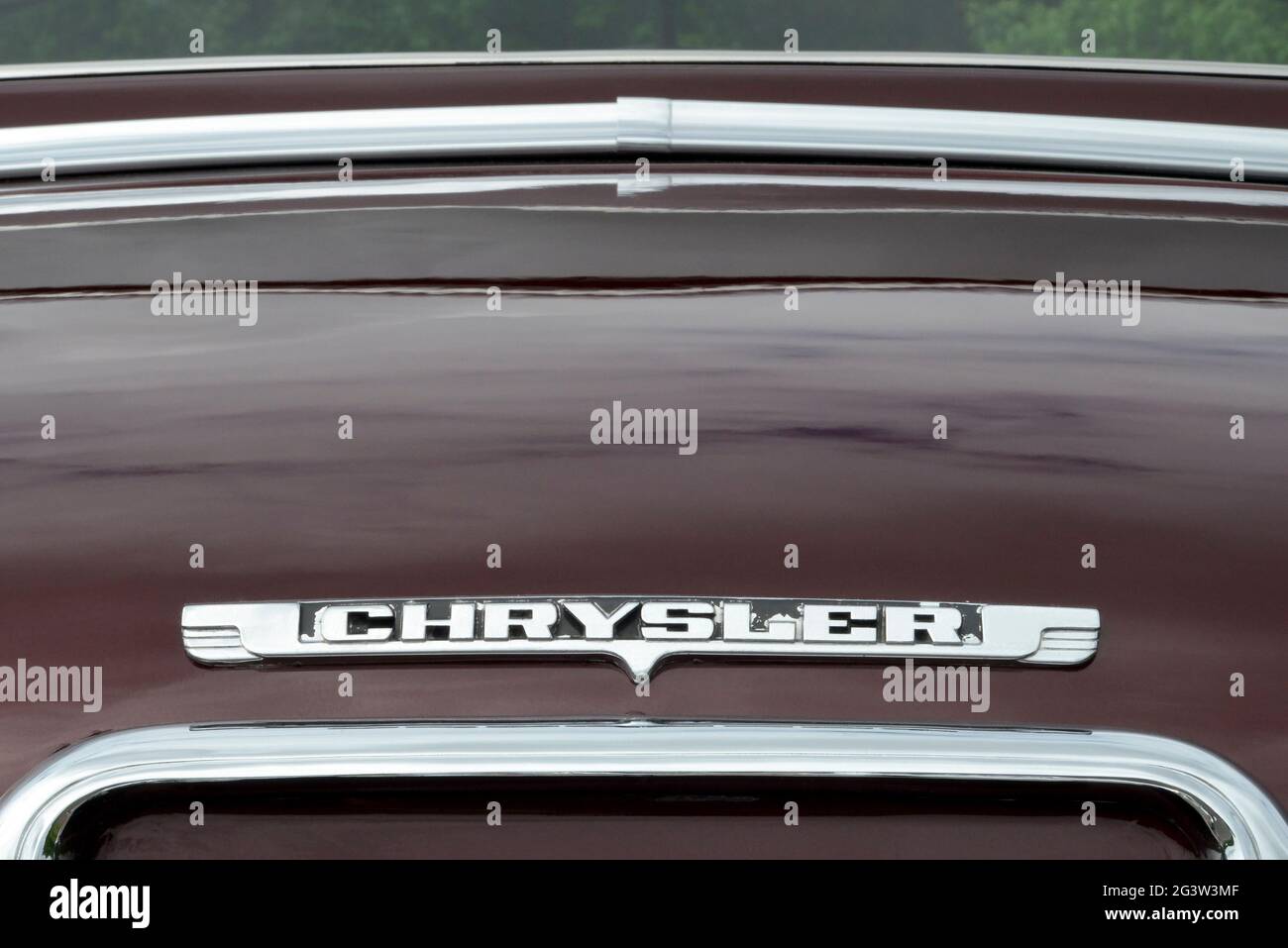 The Chrysler emblem on the trunk lid of a 1949 Chrysler Windsor sedan. Stock Photo