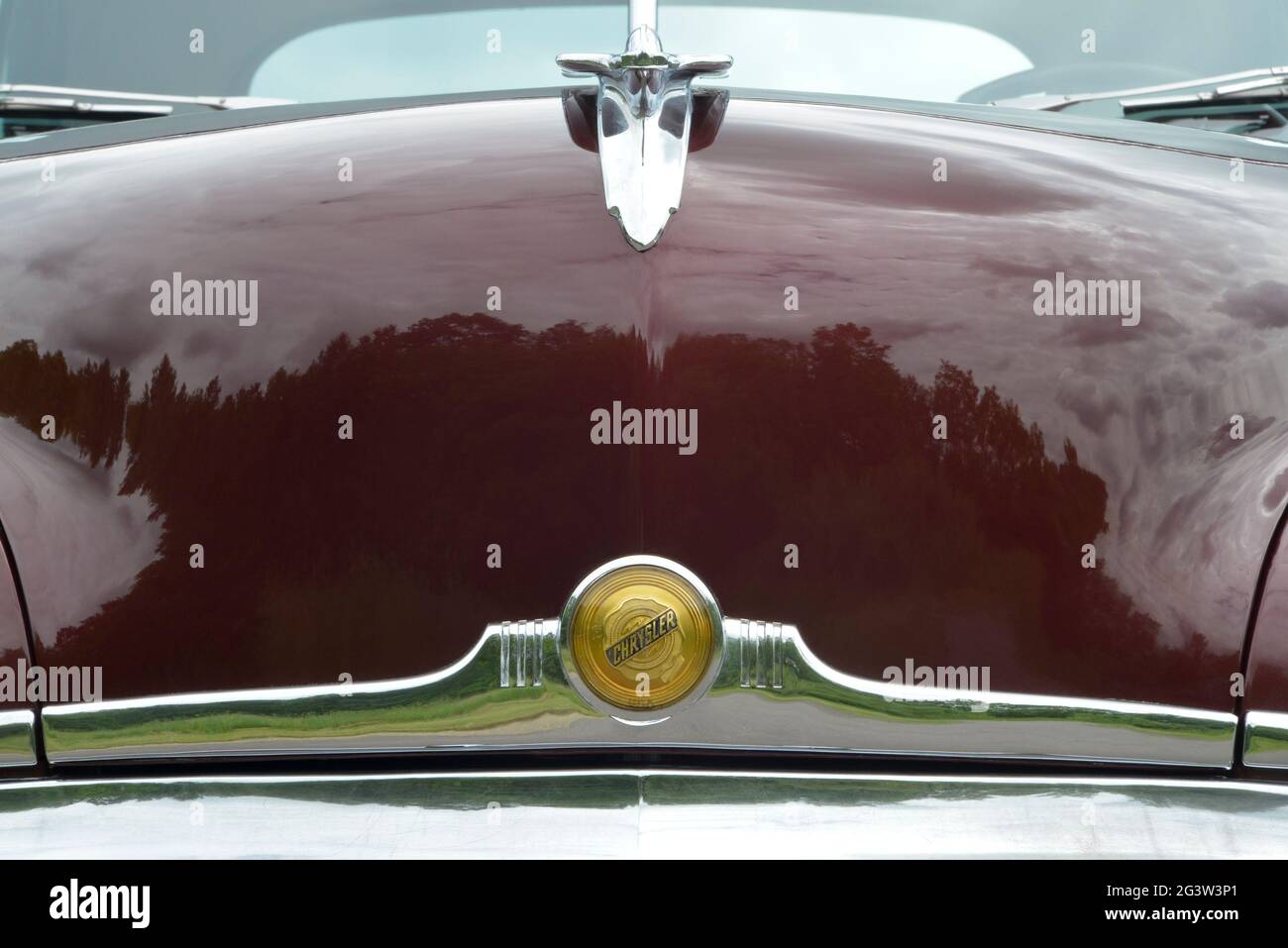 The hood ornament and emblem of a 1949 Chrysler. Stock Photo