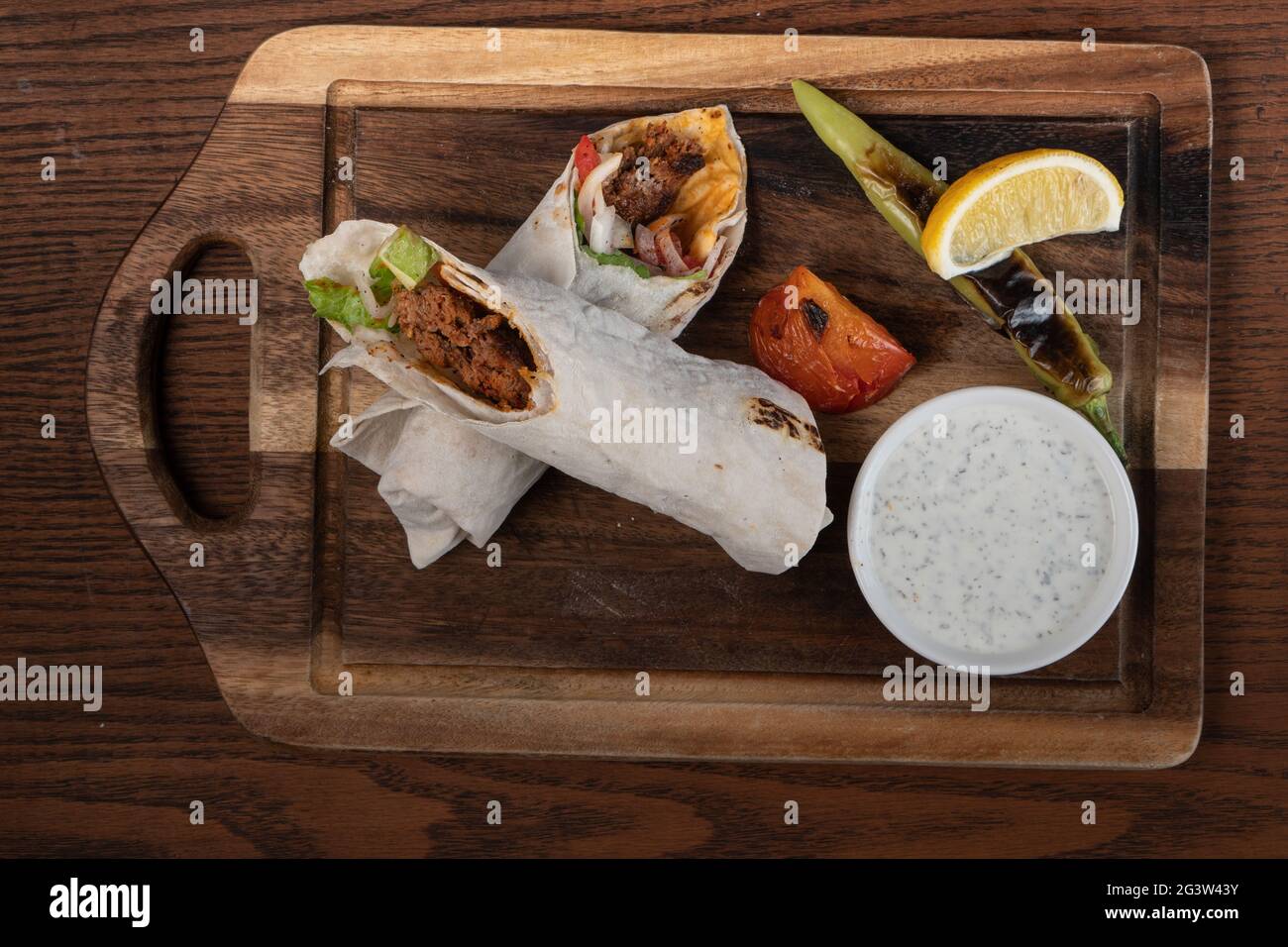 Turkish and Arabic traditional Ramadan Adana kebab roll wrap serving