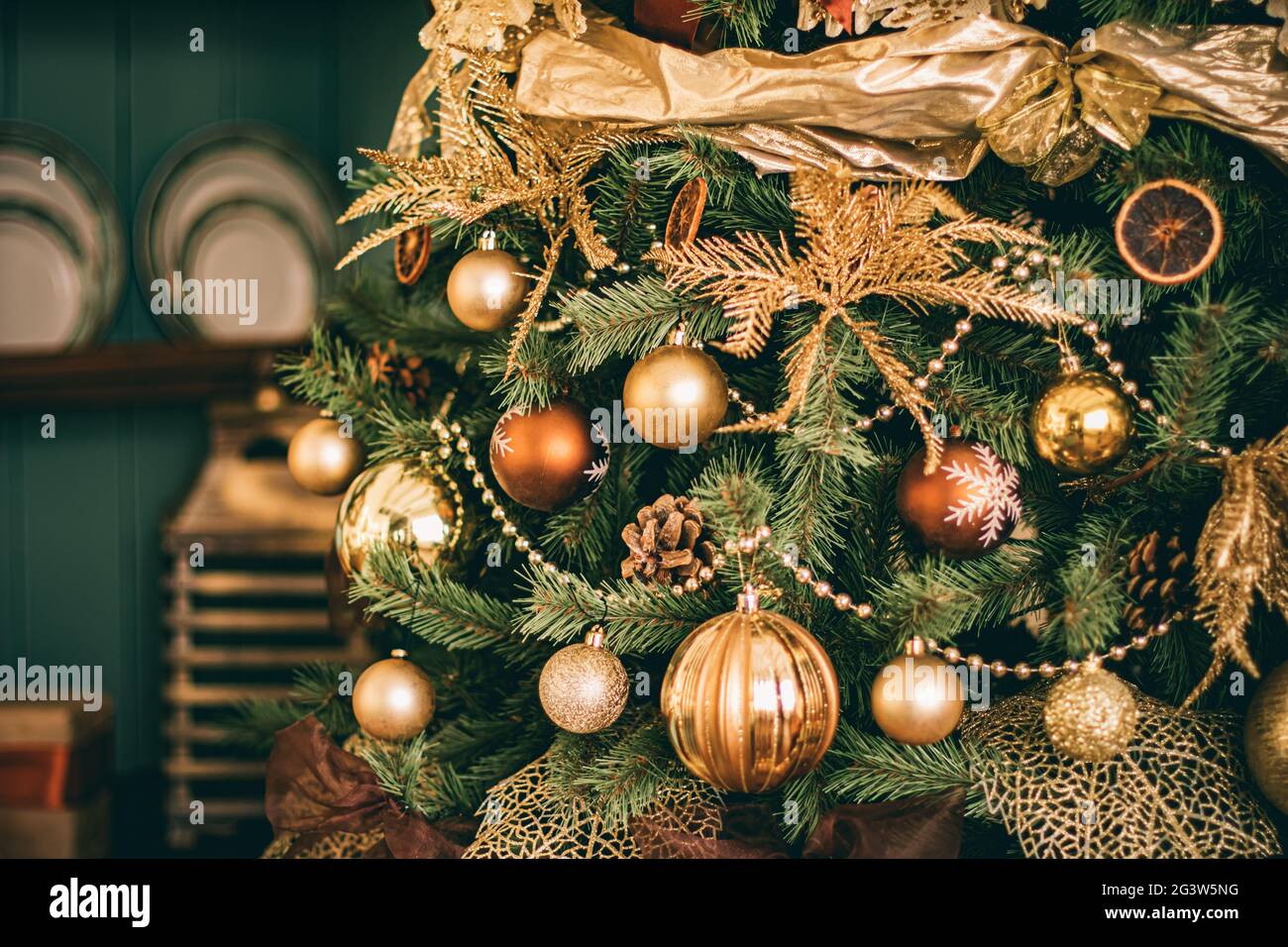 Golden Christmas tree look, decor in country style as holiday home ...