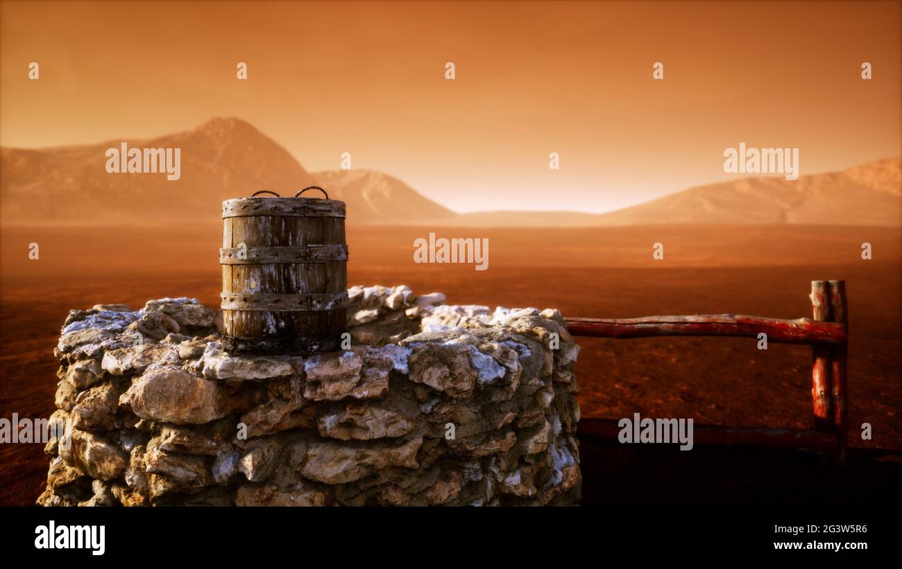 Old stone water well in the desert Stock Photo - Alamy