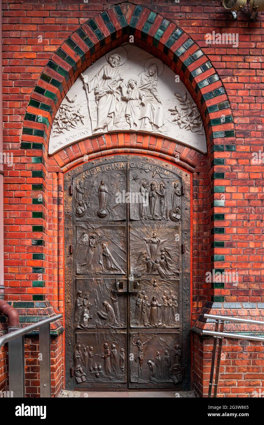 Ornate iron door of a lesser basilica, Roman Catholic Parish of St. John the Baptist in Szczecin Stock Photo