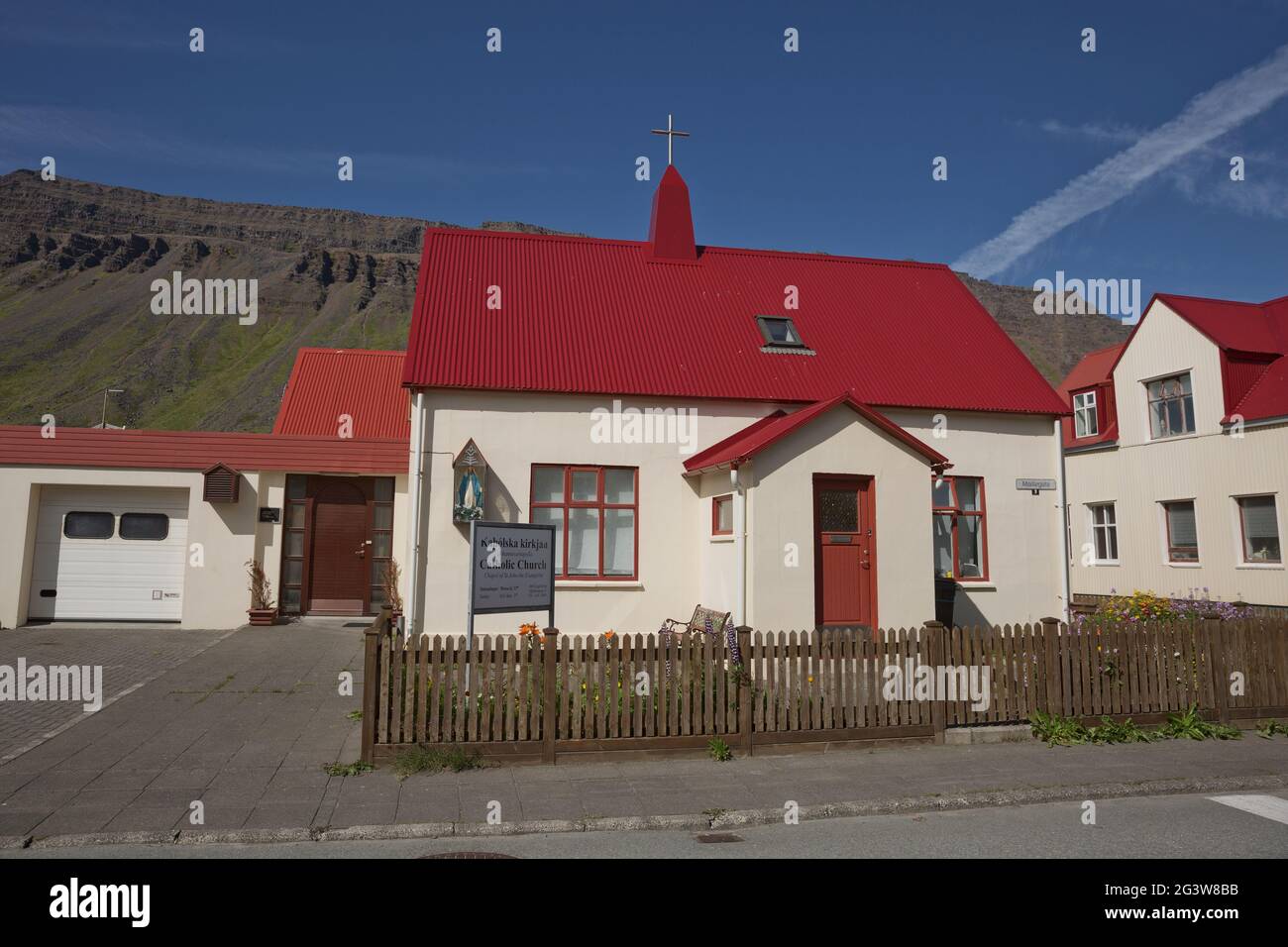 Beautiful colorful native catholic church in village of Isafjordur in Iceland Stock Photo