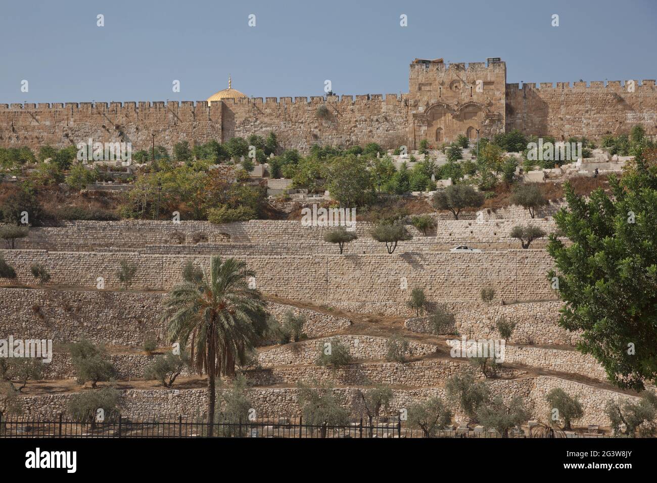 Terraces of the Kidron Valley and the the wall of the Old City in Jerusalem in Israel Stock Photo