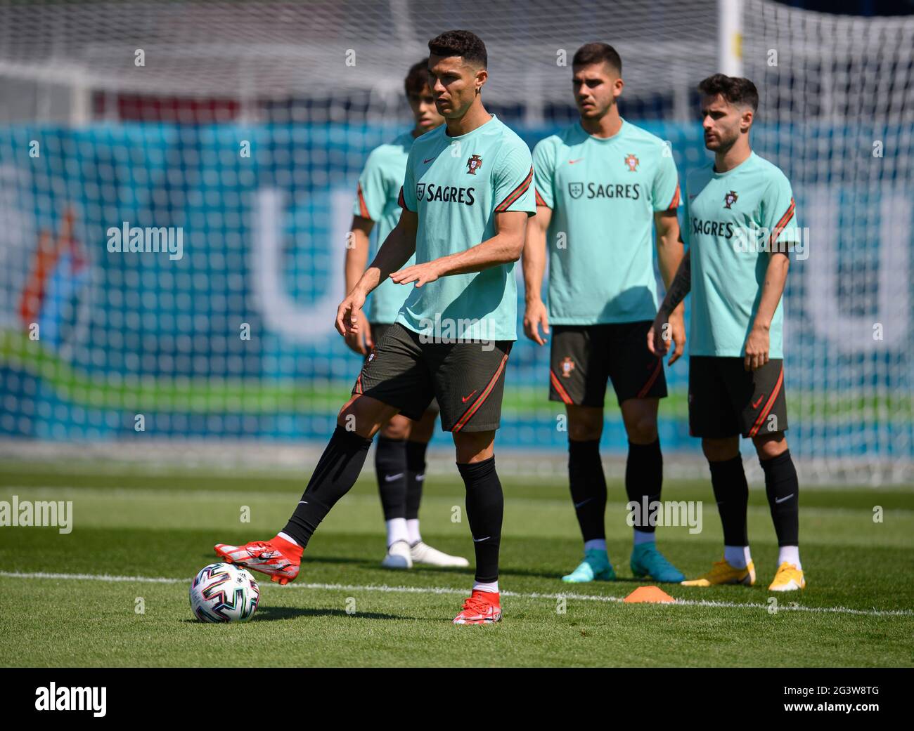 Budapest, Hungary. 17th June, 2021. Football: European Championship, Group F, before the match Portugal - Germany, Portugal training. Cristiano Ronaldo is on the field in front of Joao Felix (l-r), Andre Silva and Gonçalo Guedes. Credit: Robert Michael/dpa-Zentralbild/dpa/Alamy Live News Stock Photo