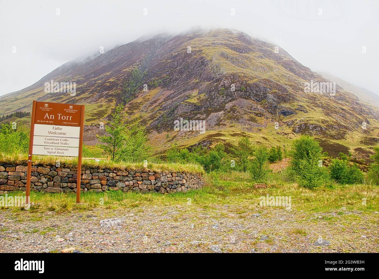 Sign Board of An Torr and Signal Rock near A82 road of Scottish Highlands. Taken in Scotland, United Kingdom on Jun 1, 2013. Stock Photo