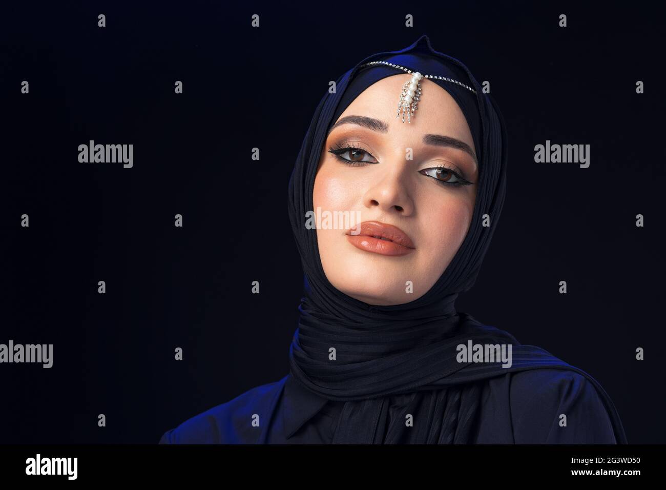Close up portrait of beautiful muslim girl dressed in hijab Stock Photo ...
