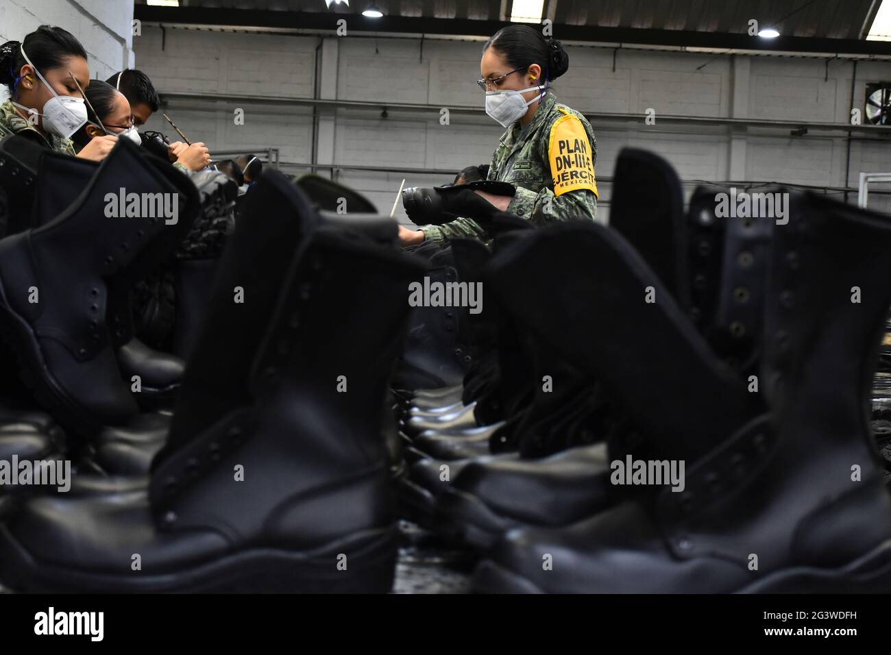 Non Exclusive: MEXICO CITY, MEXICO - JUNE 16: Military are seen during the  production process of of Mexican Army boots at the Factory of Military Cl  Stock Photo - Alamy