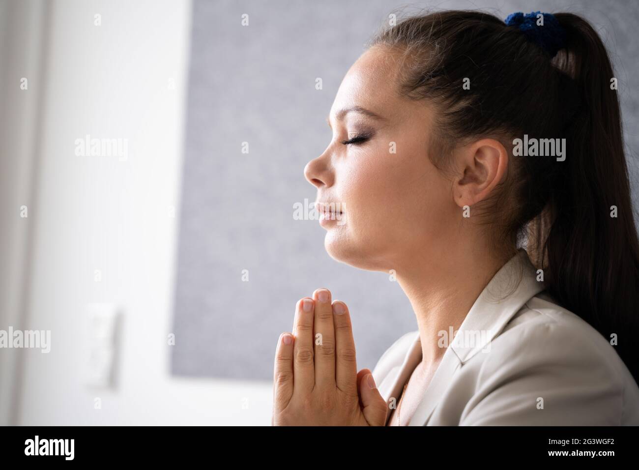 Pondering Thinking Contemplative Woman. Religious Female Prayer Stock Photo