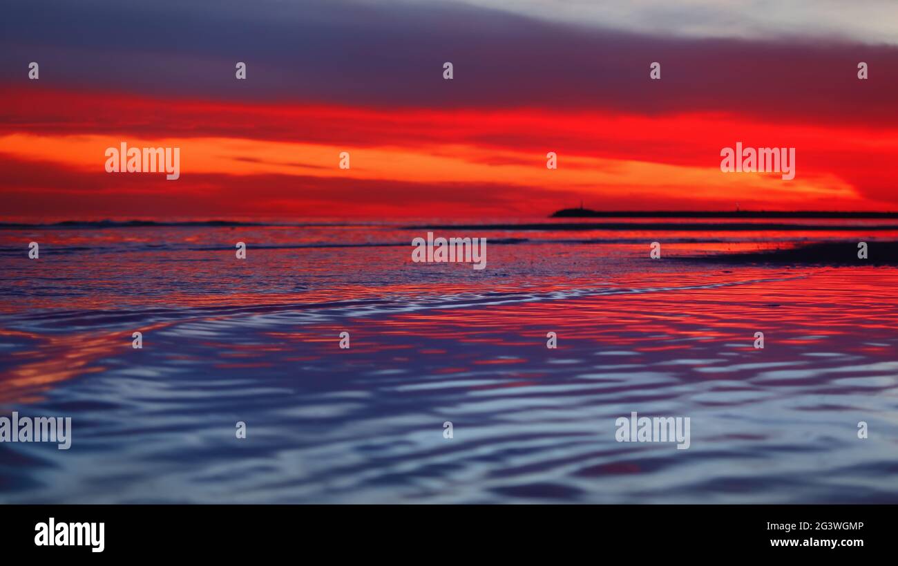 beautiful sunset over the ocean, shallow depth of field Stock Photo