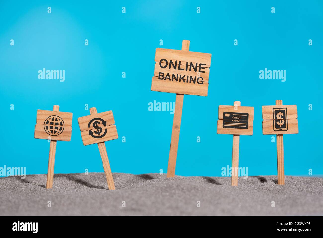 Concept of online banking with icons on wooden signs Stock Photo Alamy