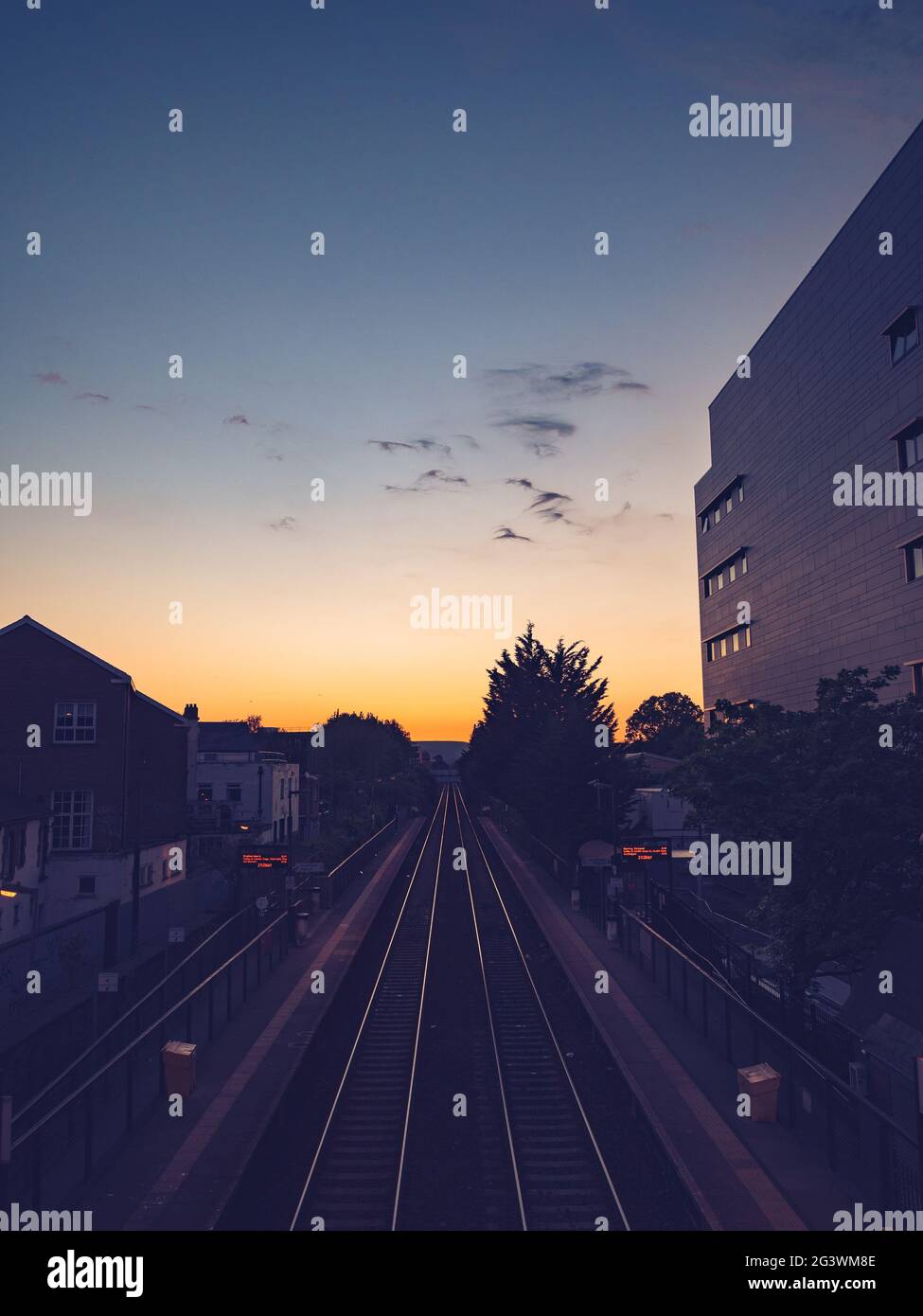 Photo of sunset seen from a bridge at Cathays train station in Cardiff