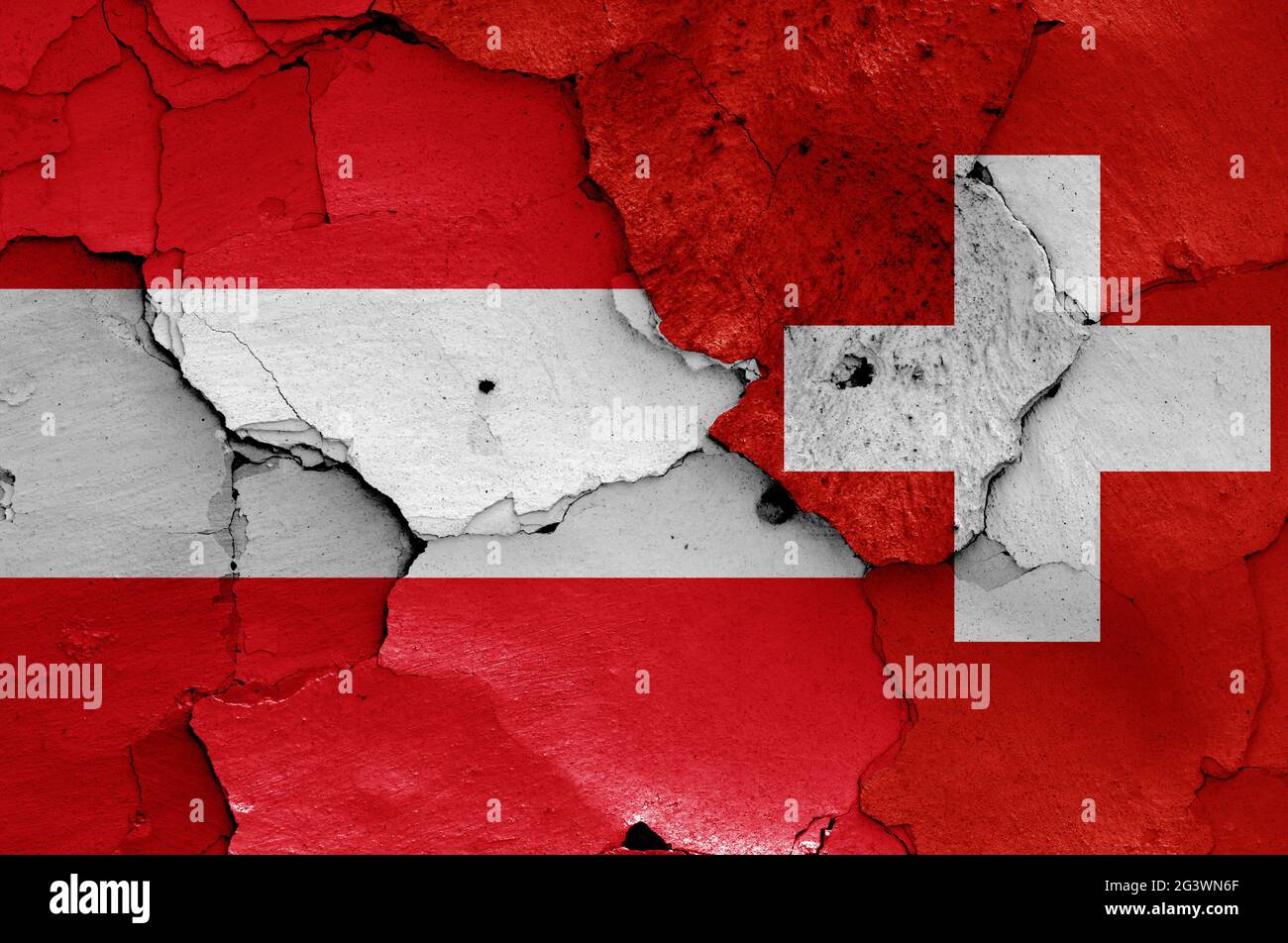 Flags of Austria and Switzerland painted on cracked wall Stock Photo ...