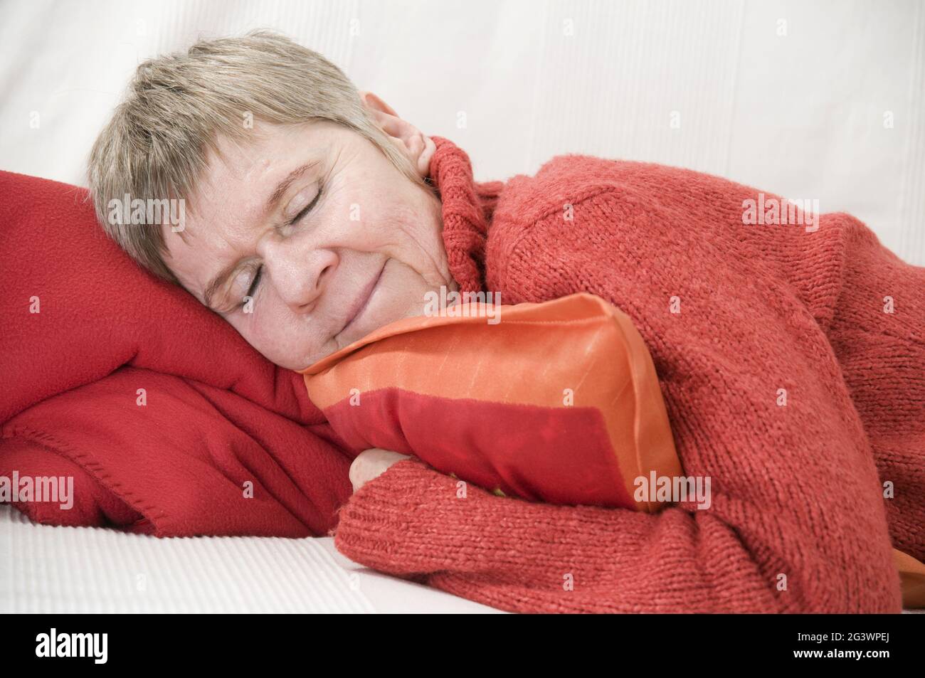 Mature woman sleeping Stock Photo
