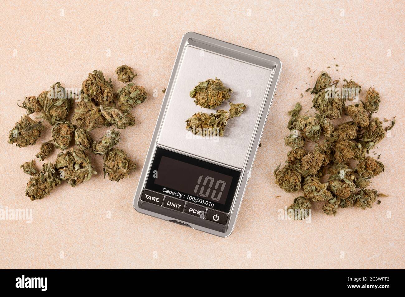 Cannabis buds on digital scale. Stock Photo
