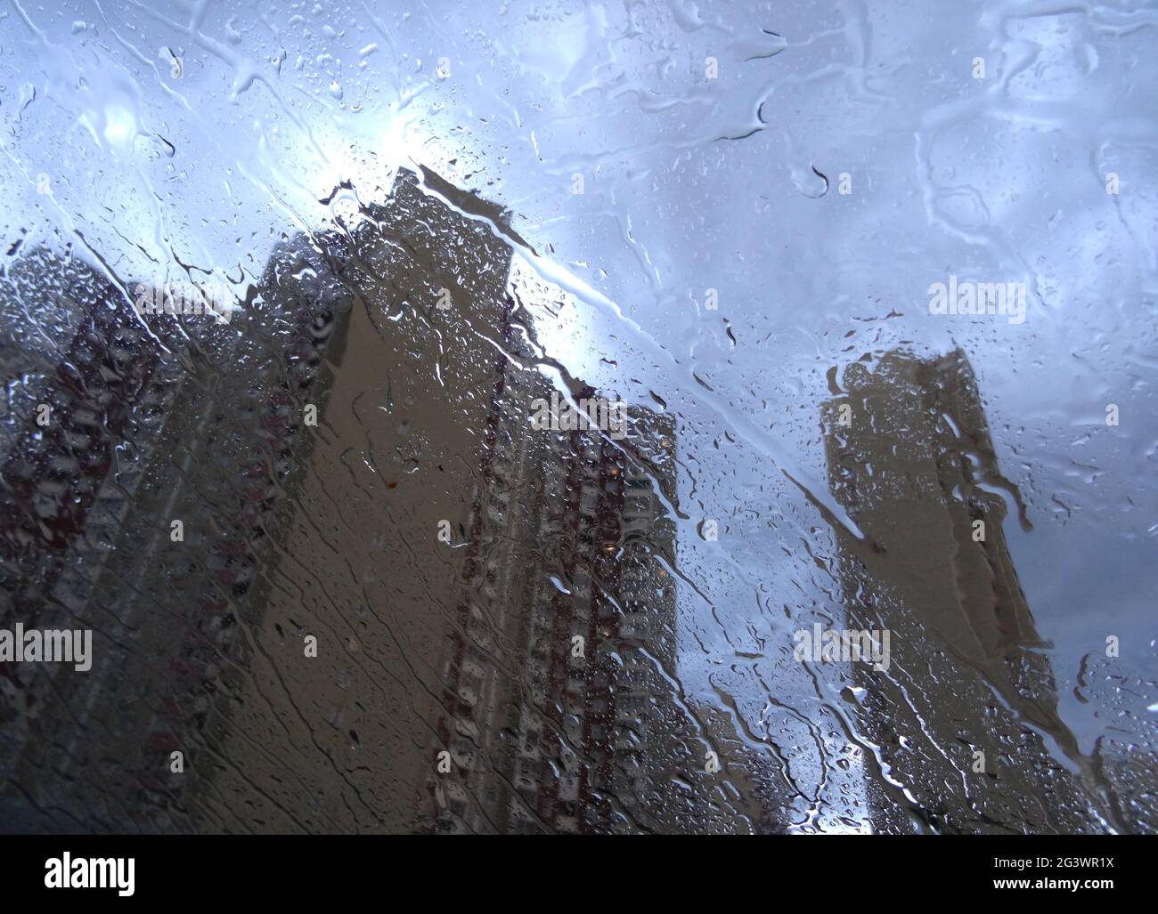 City Buildings Through Car Windshield With Drops Stock Photo