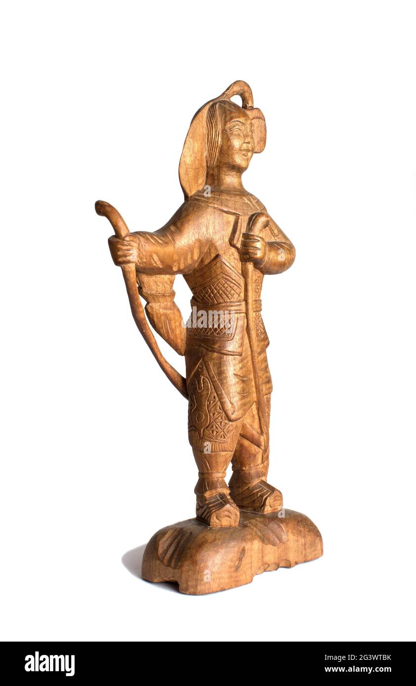 Old wooden asian statuettes Stock Photo