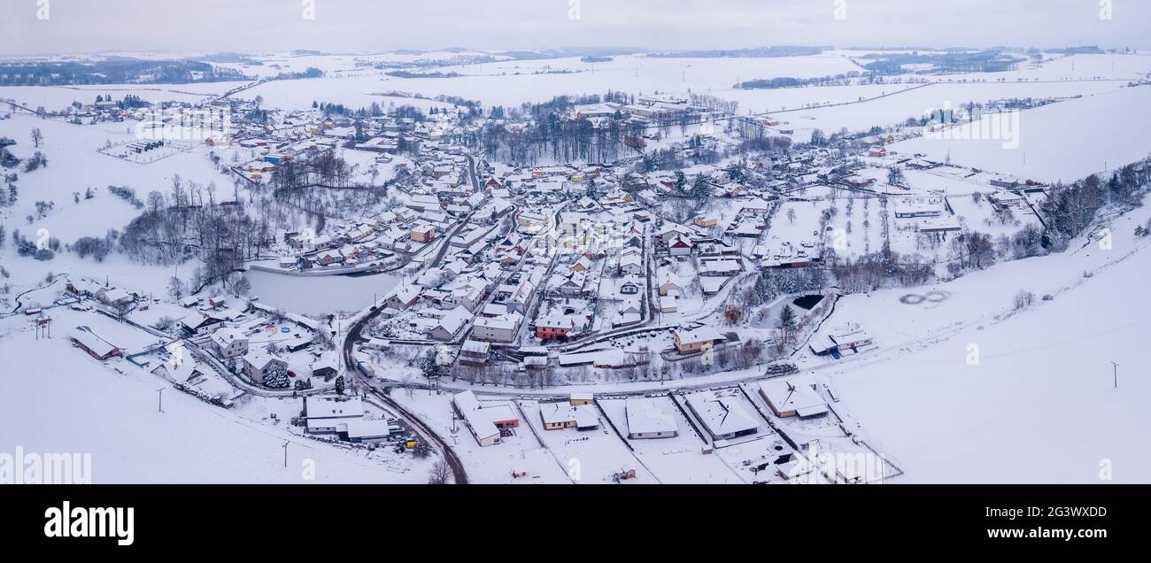 Aerial view of village with residential buildings in winter. Stock Photo