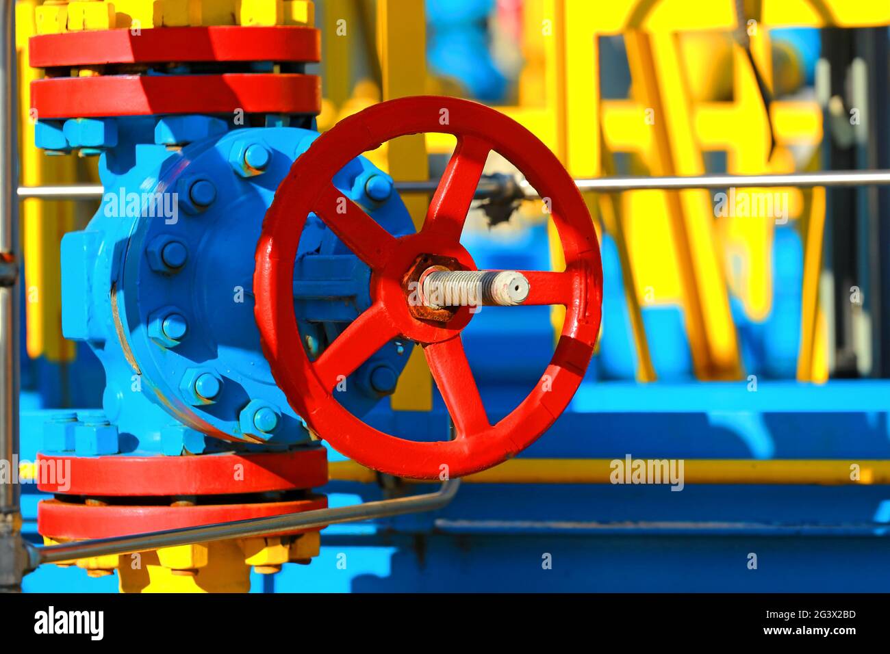 Red Shut Off This is a red shut-off valve close-up on a sunny day in an open ...