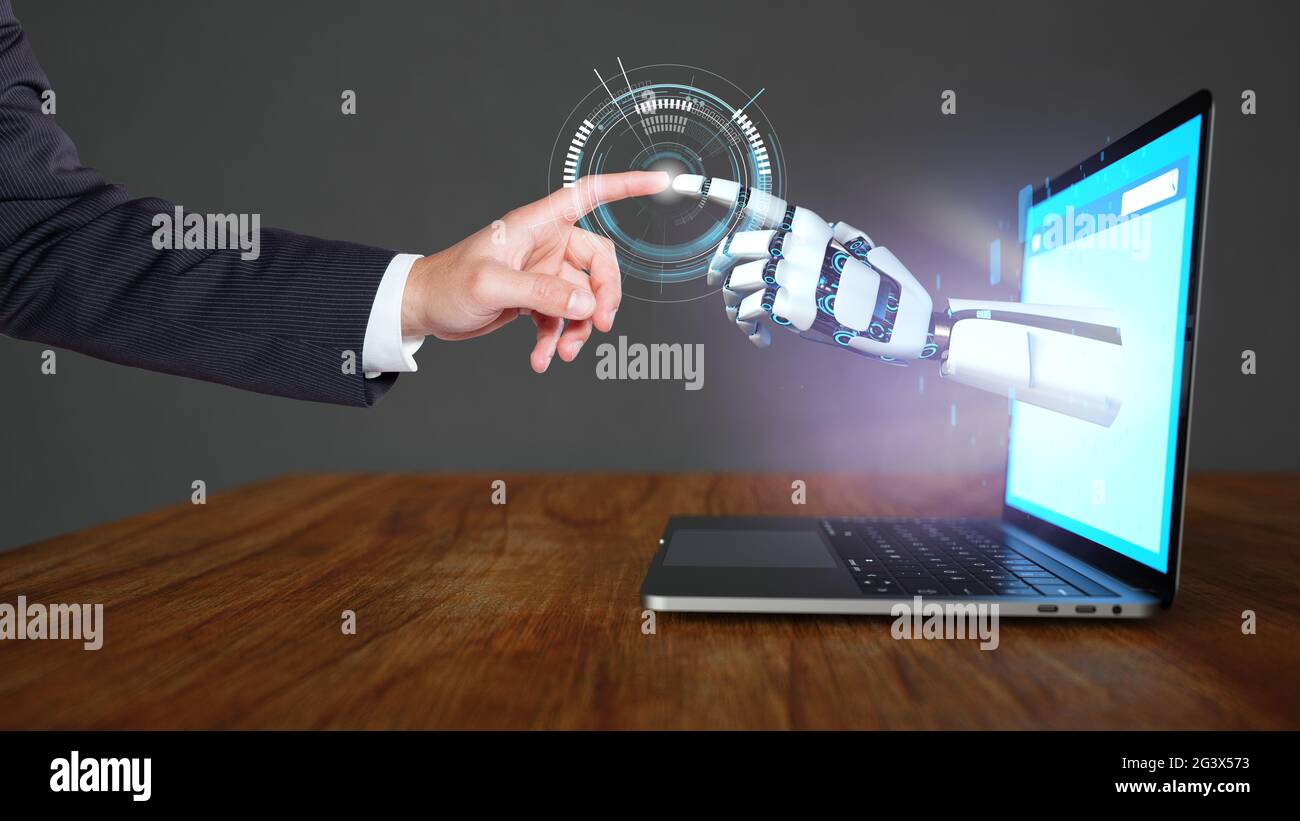 Human and robot contact Stock Photo